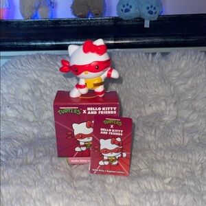 McDonald’s happy meal Sanrio Hello Kitty x Raphael Figure for a game of sorts